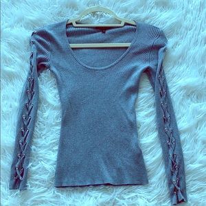 Guess gray sweater with crisscrossing sleeves